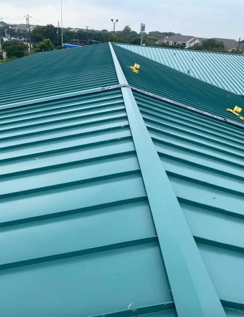 Green commercial metal roof ridge and valley for Metal Roof Repair in Eastmont