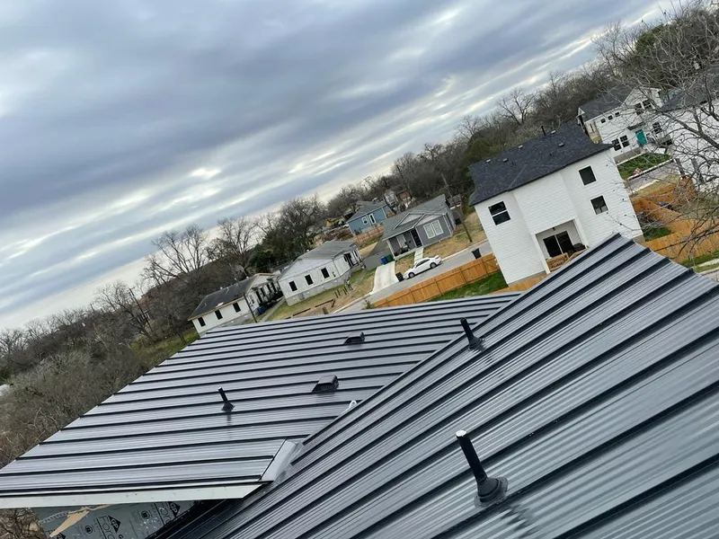Standing seam metal roof panels with vents for Skylight Repair in Eastmont